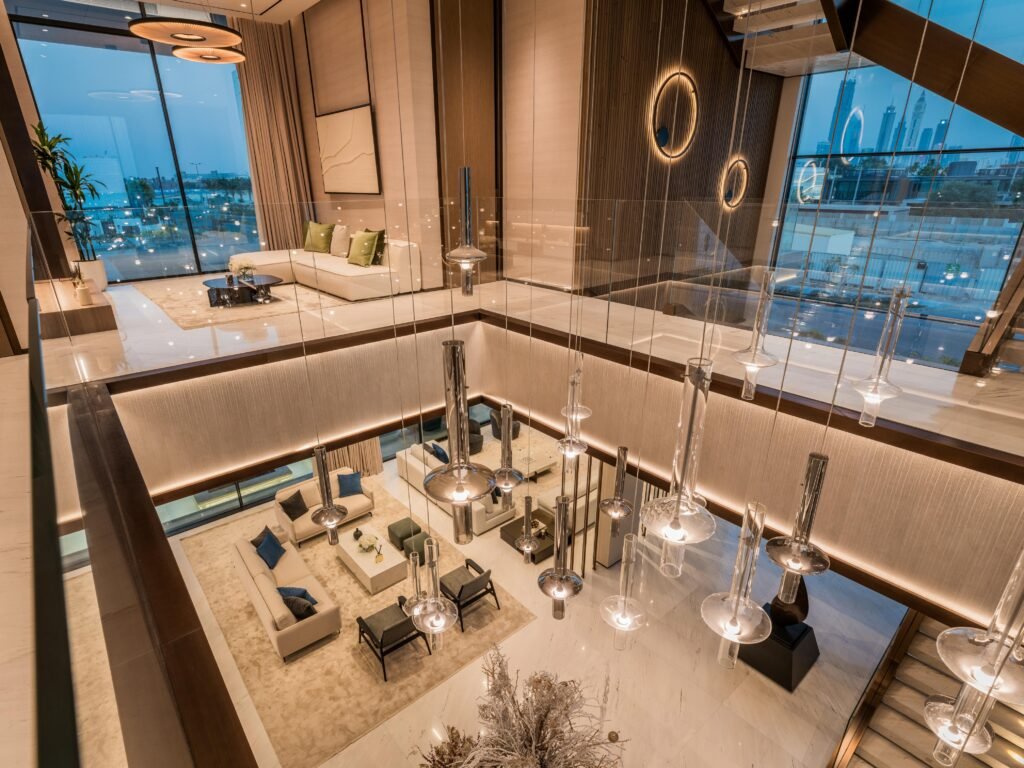 Double height living volume viewed from the first floor gallery, Harrisoni Villas, La Mer South, Jumeirah 1, Dubai