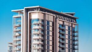 Modern mid rise apartment building with balconies against a clear sky