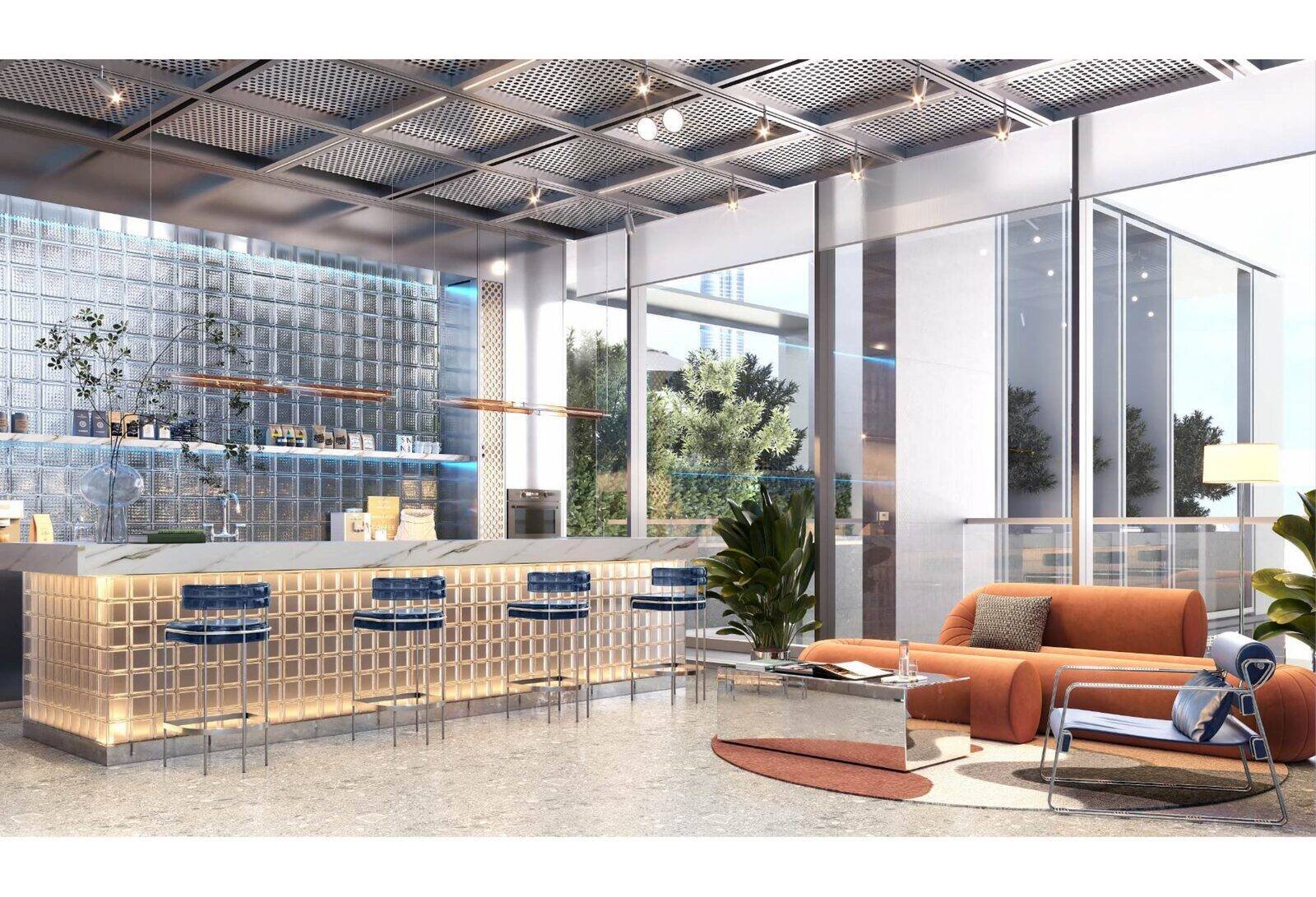 Resident cafe and juice bar at KORE by Imtiaz with a marble counter and bar seating