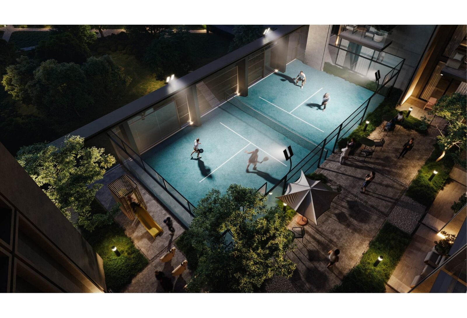 Floodlit padel court at KORE by Imtiaz seen from above at night