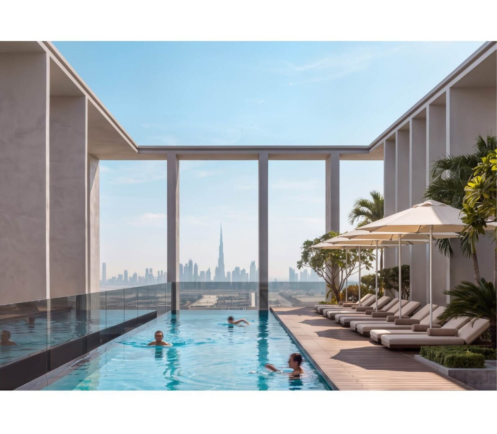 Adults leisure pool at KORE by Imtiaz with a sunset deck and the Burj Khalifa skyline beyond