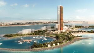 Aerial render of Wynn Al Marjan Island, Ras Al Khaimah, with the hotel tower and marina